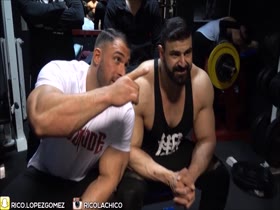 Rico Lopez Gomez poses for his muscle buddies...
